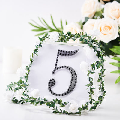 Table number 5 with floral decoration for events or weddings.
