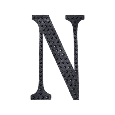 Black textured letter "N" on a plain background