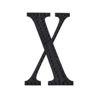 Black textured letter "X" with studded design on a plain background