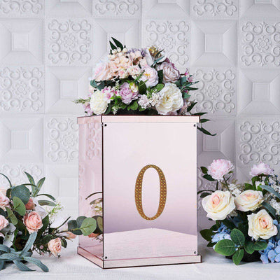 Rose gold mirrored box with floral arrangement and decorative number "0".