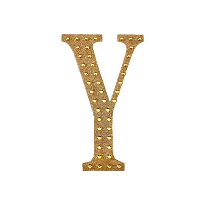Gold glitter letter Y with studded accents.