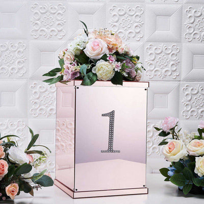 Rose gold floral arrangement box with number one, decorated with flowers.