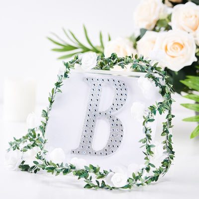 Decorative letter "B" with rhinestones and floral accents