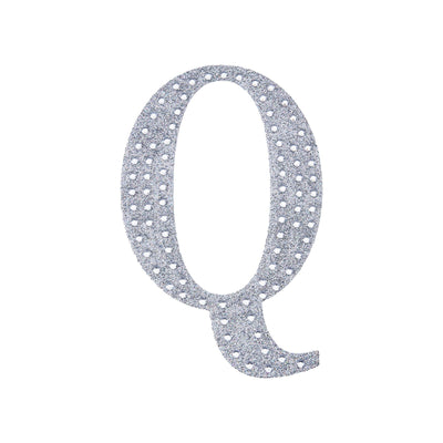 Silver rhinestone letter Q cutout on white background