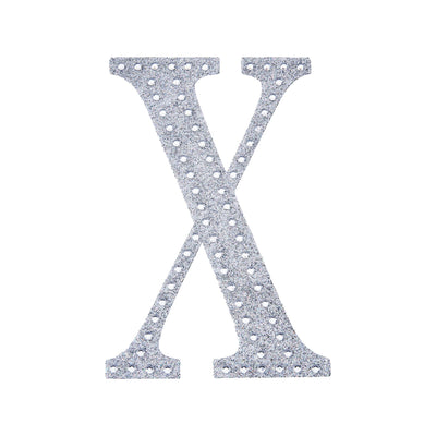 Silver glitter letter X cutout on white background