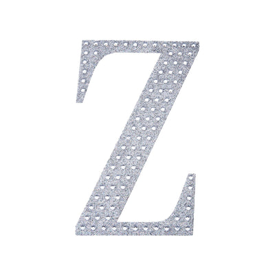Glittery silver letter Z cutout on a plain white background