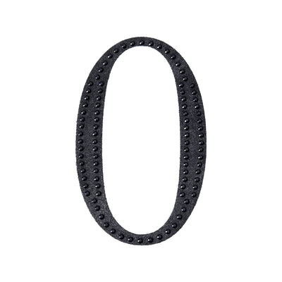 Black oval-shaped decorative frame with beaded edges