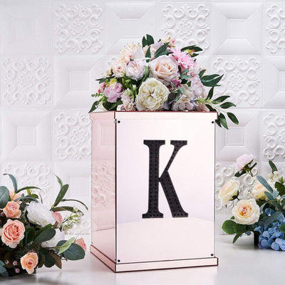 Rose gold wedding card box with floral arrangement and letter "K".