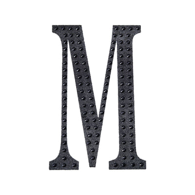 Black textured letter "M" on a white background.