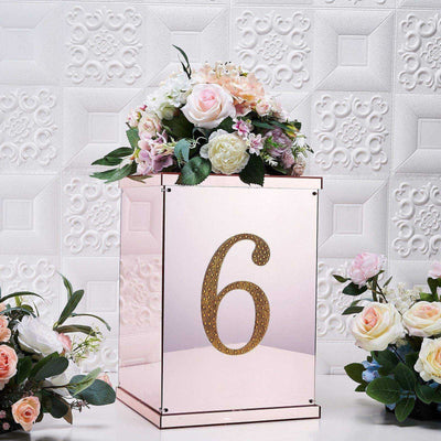 Pink mirrored table number holder with flowers, featuring the number 6.