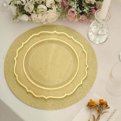 Gold glitter charger plate on a styled table setting with floral arrangements.