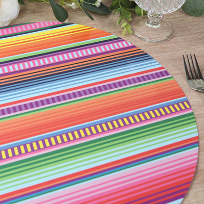 Colorful striped round placemat on a textured table setting.
