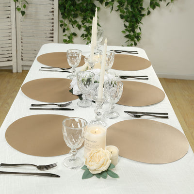 Elegant beige placemats set for a dinner table with candles and floral accents.