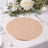 Elegant round placemat with gold trim on a beautifully set dining table.