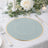 Elegant blue placemat with gold accent on a beautifully set dining table.