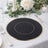 Elegant black placemat with gold rim on a beautifully set dining table.