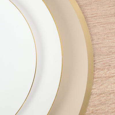 Elegant white and gold dinner plates stacked together.