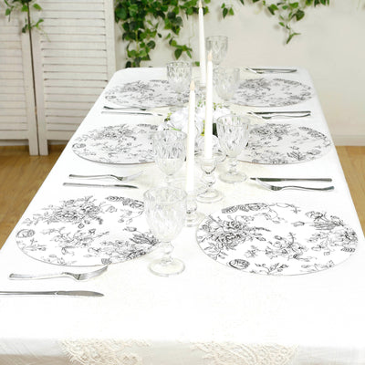 Elegant floral dinnerware set on a beautifully arranged dining table.