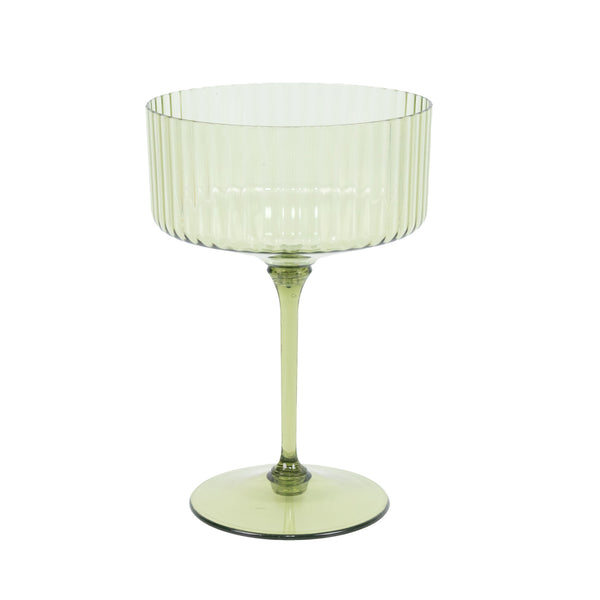 Green ribbed glass coupe cocktail glass on a stem, isolated on white#whtbkgd