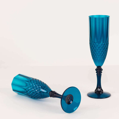 Blue crystal champagne flutes in elegant design on white background