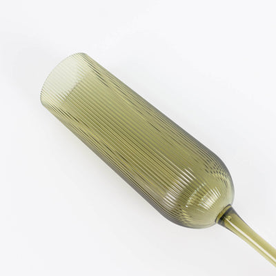 Translucent ribbed glass vase with olive tint on white background