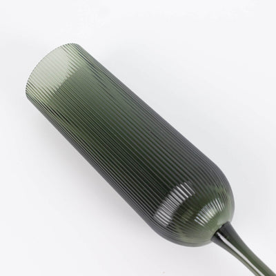 Green ribbed cylindrical pendant light with sleek modern design