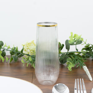 Elegant glass vase with ribbed texture and gold rim, perfect for floral arrangements.