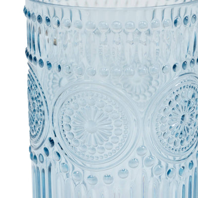 Blue embossed glass vase with circular decorative patterns