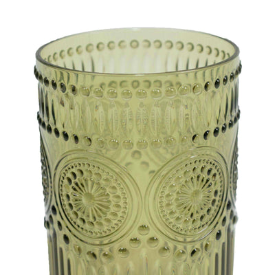 Green embossed glass tumbler with decorative circular pattern