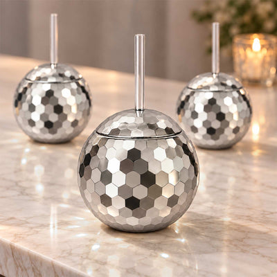 Close-up of glossy silver faceted hexagon mirror tiles on a disco ball cup