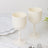 Elegant cream-colored ribbed goblets on a marble table.