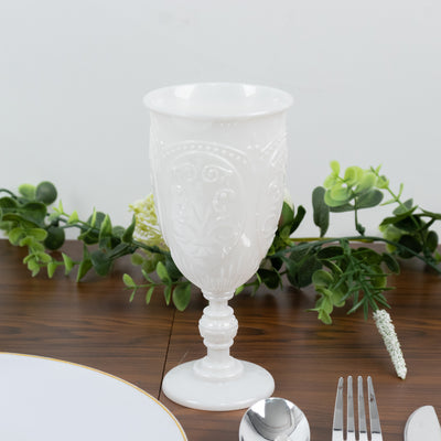 Elegant white decorative goblet with intricate design details.