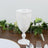 Elegant white decorative goblet with intricate design details.