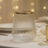 Gold-rimmed ribbed glass tumbler on elegant table setting