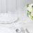 Elegant clear glass goblets with intricate patterns, perfect for dining.