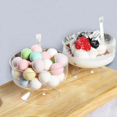Colorful dessert bowls with pastel sweets and creamy dessert.
