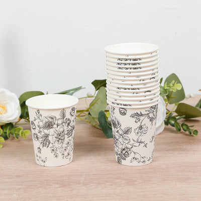 Floral design paper cups stacked with one cup in front