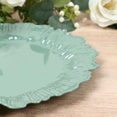 Green decorative plate with textured edge on wooden surface.