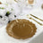 Gold decorative plate with a fluted edge on a table setting.