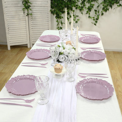 Elegant lavender dinnerware set on a beautifully arranged dining table.