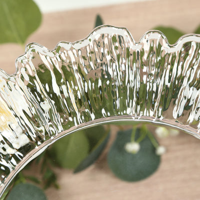 Textured glass bowl edge with decorative detailing.