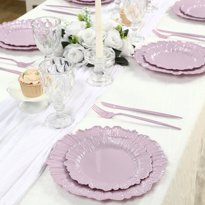 Elegant lavender dinnerware set arranged on a beautifully styled dining table.