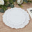 Three elegant white decorative plates stacked on a wooden table.