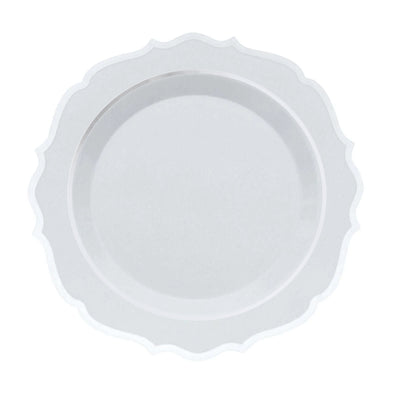 Elegant white decorative plate with a scalloped edge design.