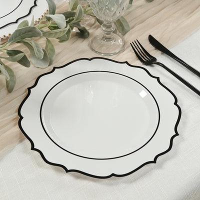 Elegant white plate with black rim on a textured table setting.