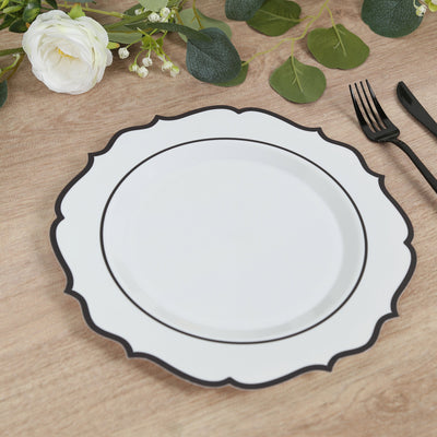 Elegant white plate with black rim on wooden table