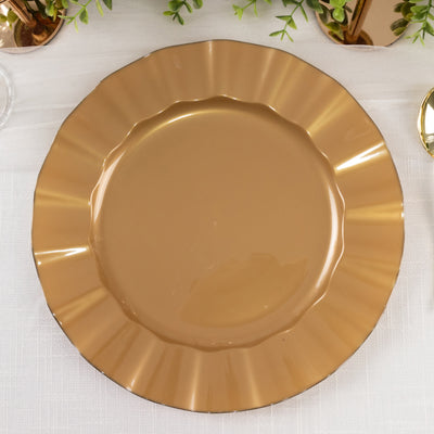 Gold scalloped dinner plate on a table setting.