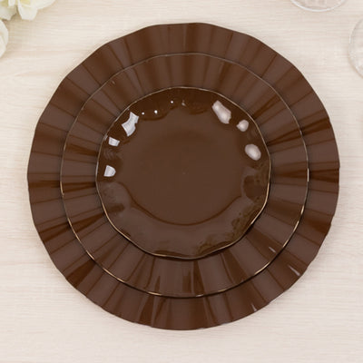 Brown decorative plates in three sizes stacked together.