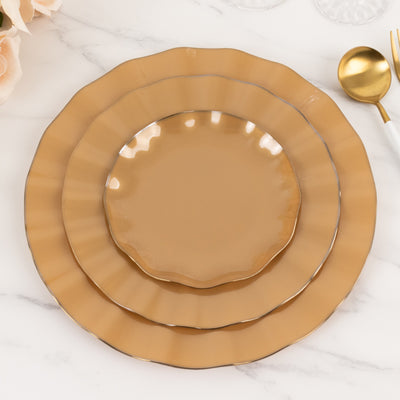 Set of three elegant brown plates with a wavy edge design.
