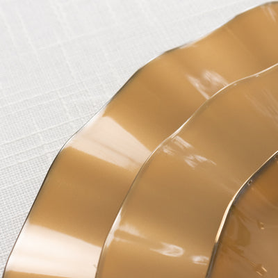 Three glossy, caramel-colored wavy decorative plates.
